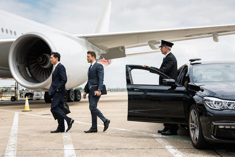 Business airport transfer with a luxury chauffeur-driven vehicle for executive and corporate travel.