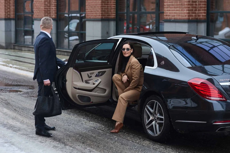 Executive car service with a luxury chauffeur-driven vehicle for business professionals and VIP transportation.