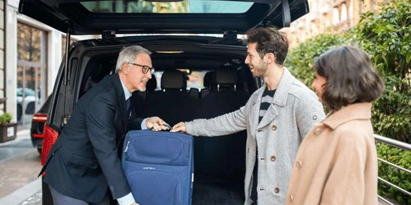 Hotel transfer service with a luxury chauffeur-driven vehicle for comfortable and reliable transportation.