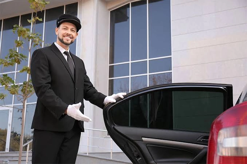 Professional chauffeur providing premium, reliable, and discreet transportation in a luxury vehicle.