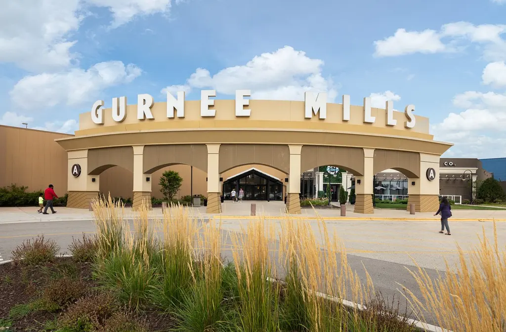 Luxury limo service in Gurnee with a sleek black stretch limousine parked in a clean suburban setting, highlighting premium transportation and comfort.